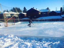 The ice rink/ice hockey rink used at home, outdoors in the sunshine