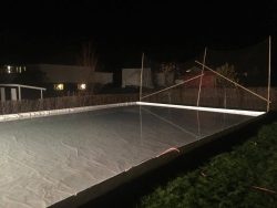 Wooden frame fitted for the home ice rink before the ice is to be flushed.
